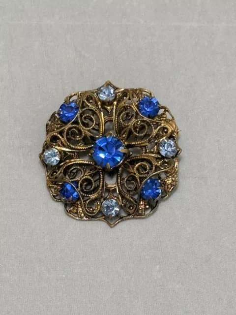 Vintage Western Germany Blue Rhinestone Brass Flower Floral Brooch Pin. Used