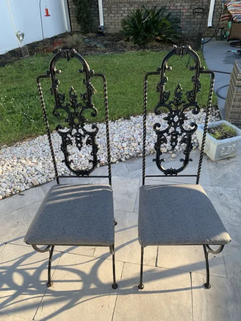 Chairs ~ Two wrought iron chairs with Faux embossed snakeskin pattern leather