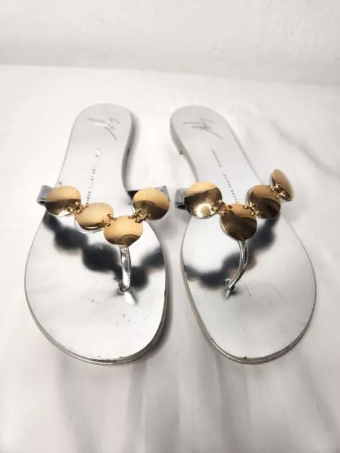 Giuseppe Zanotti Disc Detailed Flat Thong Sandals Silver Gold Metallic Leather40