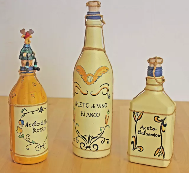https://www.picclickimg.com/ii8AAOSwyrFZOuqn/Vintage-Liquor-Bottle-Set-of-3-Hand-Crafted.webp