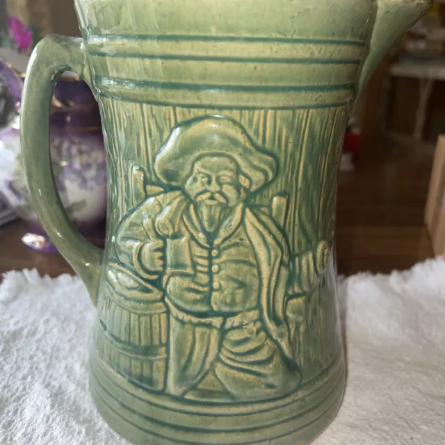 A RARE VINTAGE McCOY GREEN ART POTTERY SALT GLAZE STONEWARE PIRATE PITCHER