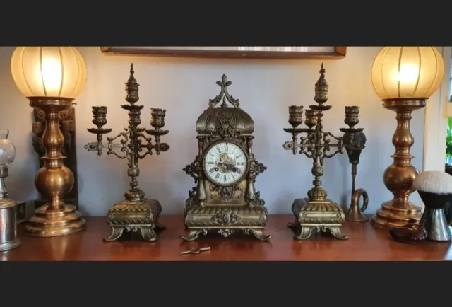 patinated bronze fireplace set composed of a pendulum clock two candelabras 1890