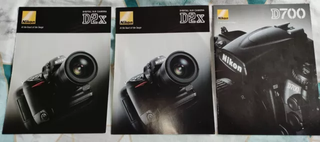 Nikon camera brochures, 2 x trifold D2X & 1 X D700 24 page, excellent condition