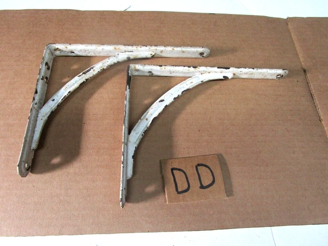 Two vintage pressed steel wall shelf mounting brackets