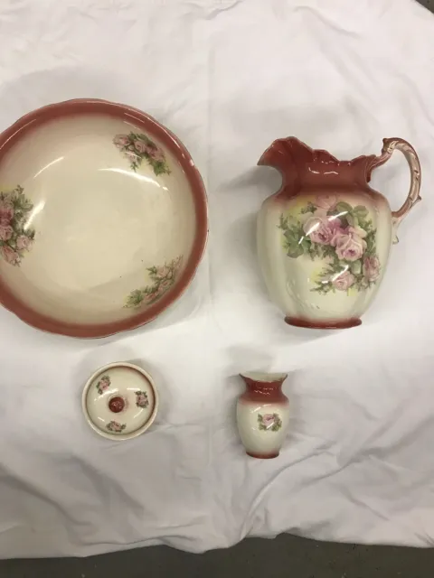 Antique washing jug, bowl, soap dish and vase set