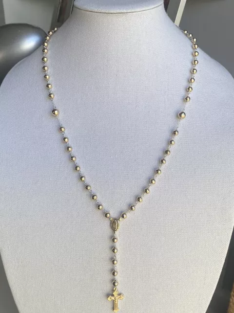 Silver 925 rosary necklace 10k gold laminated 25 inches , 18 grams weight .