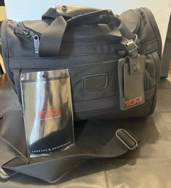 TUMI DUFFLE BAG Tote Travel Carryon Gym Bag lightly used 8-10-14” $125. ...