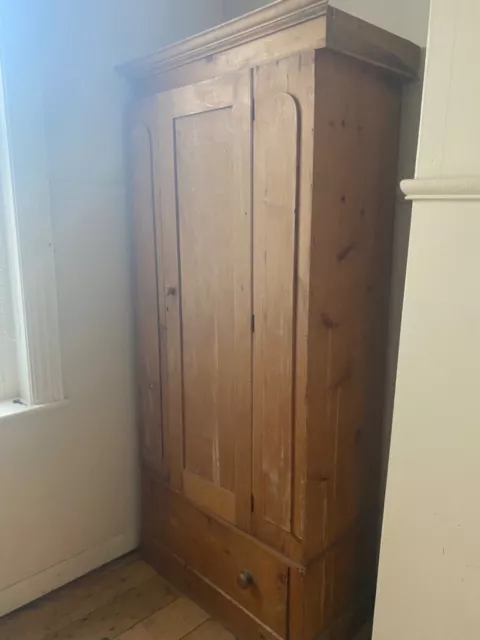 solid pine wardrobe used. Good condition, just needs new knobs on drawer