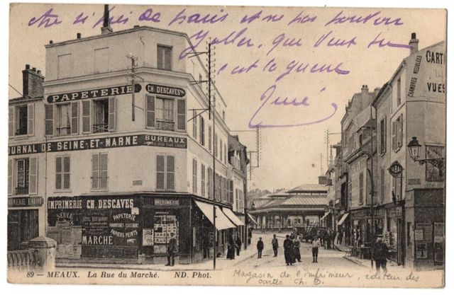 CPA 77 - MEAUX (Seine et Marne) 89. La rue du Marché - ND Phot (petite animation