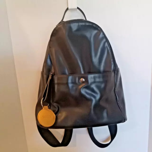 Barneys New York Black Faux Leather Backpack Bag with Barneys Bag Charm