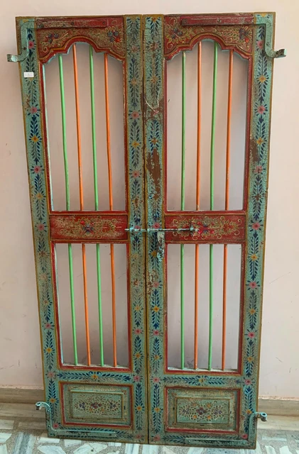 Antique wooden painted door colorful iron bars distressed old India furniture