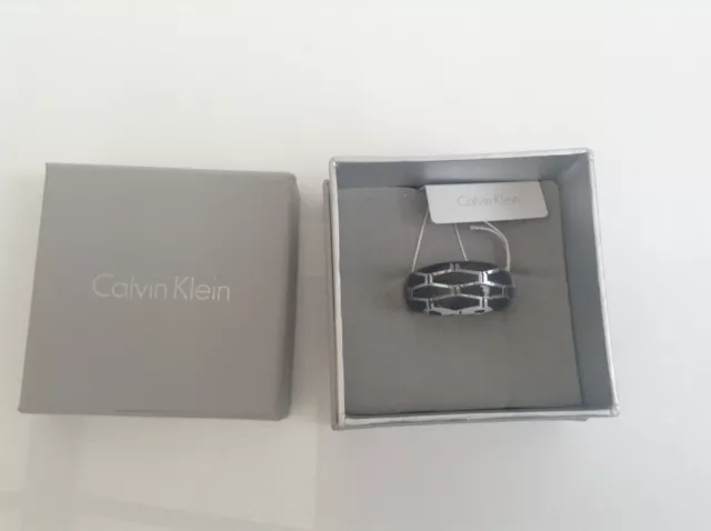 BNIB 100% Auth Calvin Klein, Ladies Luxury Abstract Grey Silver Resin Ring.