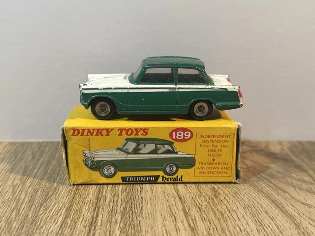 A rare Dinky Toys Triumph Herald (189). A Triumph dealer's promotional example in red. Boxed. Vehicl