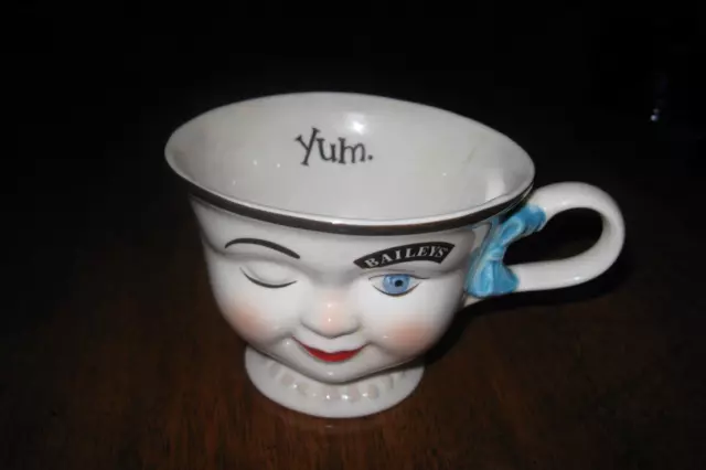 Vintage Bailey's Irish Coffee/Tea Cup YUM Female w/ Blue Hair Bow Winking Face