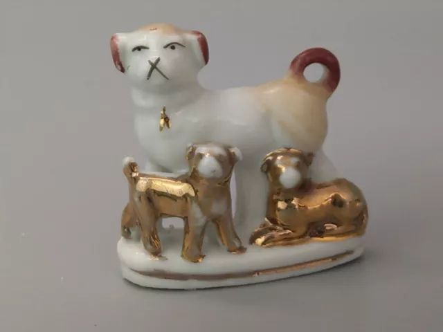Vintage miniature Pug Dog with puppies Figurine
