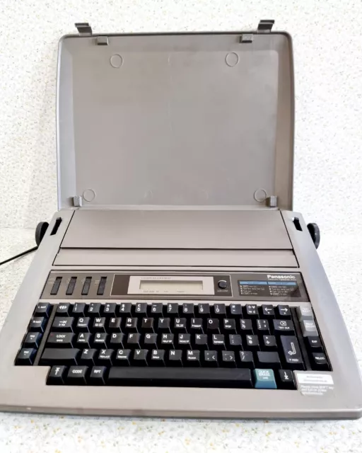 Máquina de escribir electrónica Panasonic KX-R193 con mango de transporte vintage PROBADA Y FUNCIONANDO