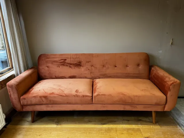 Made  burnt orange sofa bed . Not a year old Collection Only
