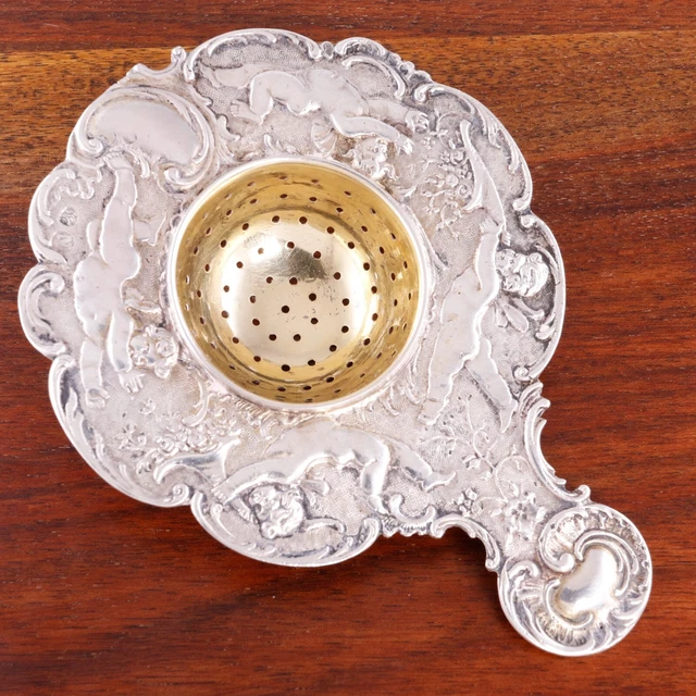Neresheimer & Sohne German Hanau Silver Tea Strainer Putti Playing Floral Catch