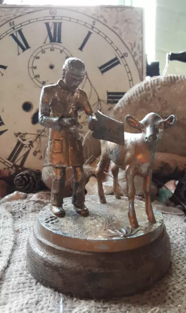 Unusual Little statue found in France of a man illustrating a calf Metal Vintage