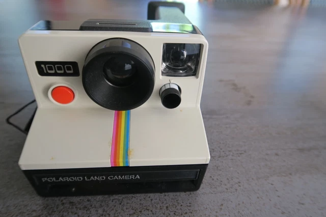 Appareil photo instantané Polaroid Vision avec son manuel d'utilisation
