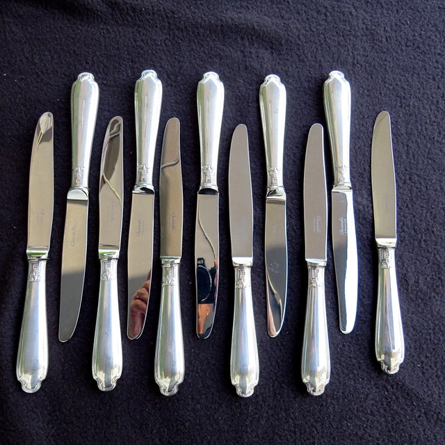 ORBRILLE. Suite de 12 couteaux à entremet, manches en métal - Lot 530