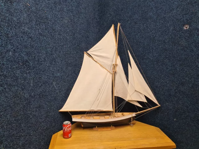 LARGE WOODEN MODEL SAILING YACHT. Approx 90cm height by 90cm length.