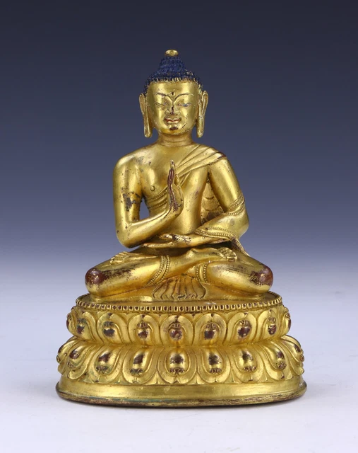 A NEPALESE ANTIQUE GILT BRONZE BUDDHA, 19th CENTURY
