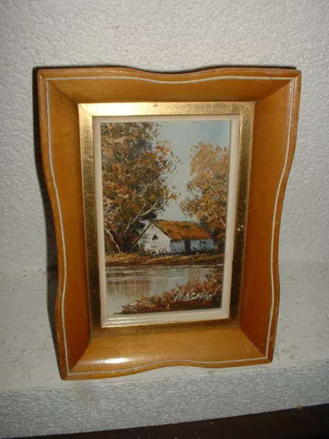 Old oil painting,{ Cottage with trees near the river, is signed, nice frame ! }.