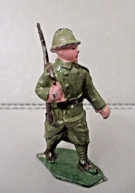 10 Soldats En Plomb Creux Au Défilé - Pièces De Collection Remises En état