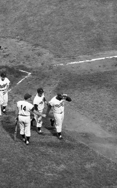 Brooklyn Dodgers Jackie Robinson walks to the dugout vs St. Louis - Old Photo