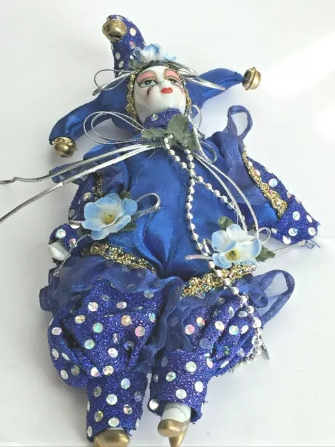 Porcelain Jointed Jester Doll in Bedazzled Blue & Gold Clothes Floral Accent 9"T