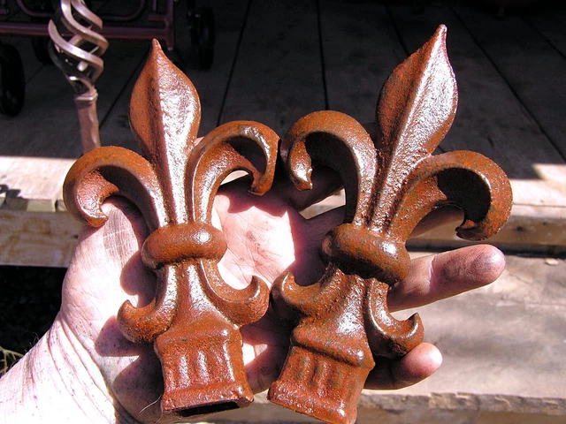 TWO cast iron Fleur De Lis finials Architectural Rust finish