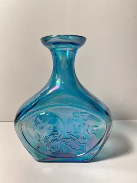Vintage 1975 Wheaton Turquoise Blue Iridescent Carnival Glass St. Luke Bottle