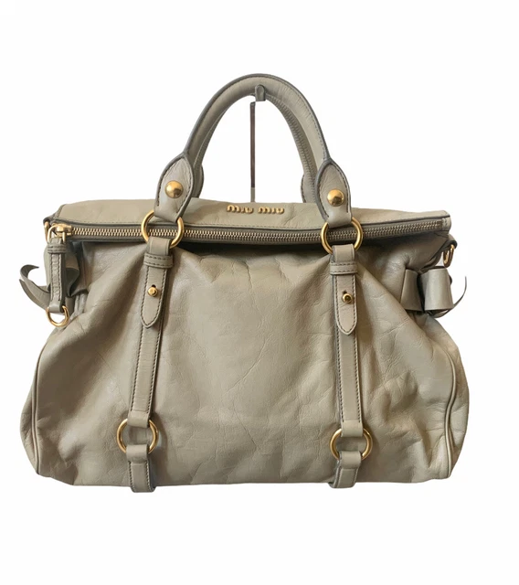 Authentic Miu Miu Vitello Lux Bow Leather Hand Bag in Cream with Gold Hardware
