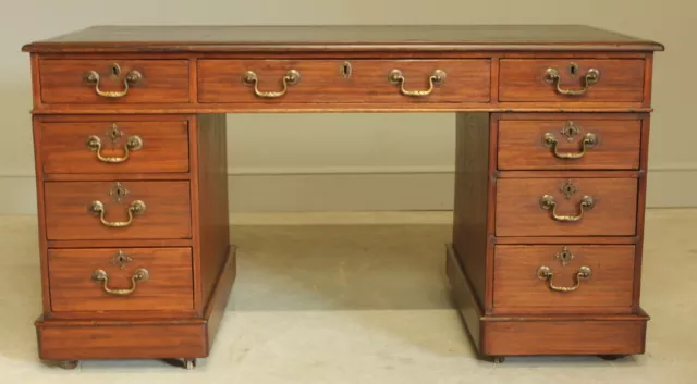 A Victorian Mahogany Twin Pedestal Desk.