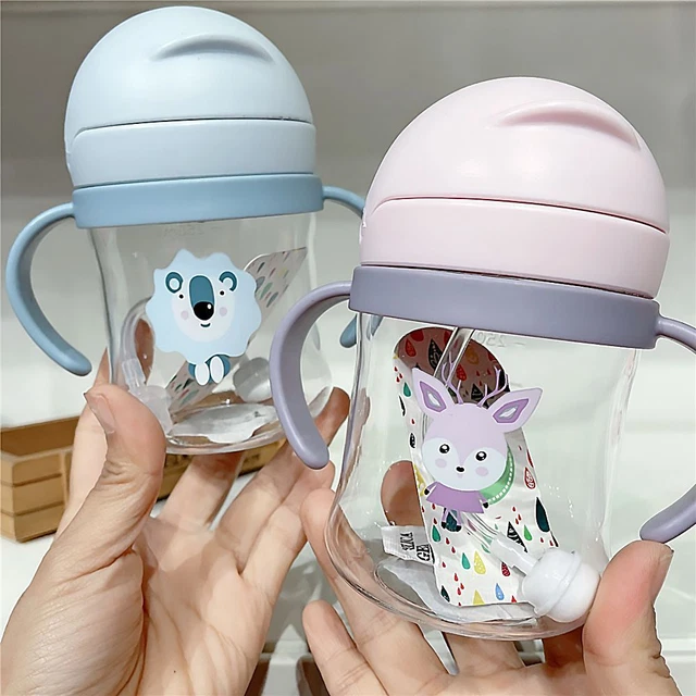Gobelet d'alimentation à poignée Buvez. Coupe d'apprentissage pour enfants
