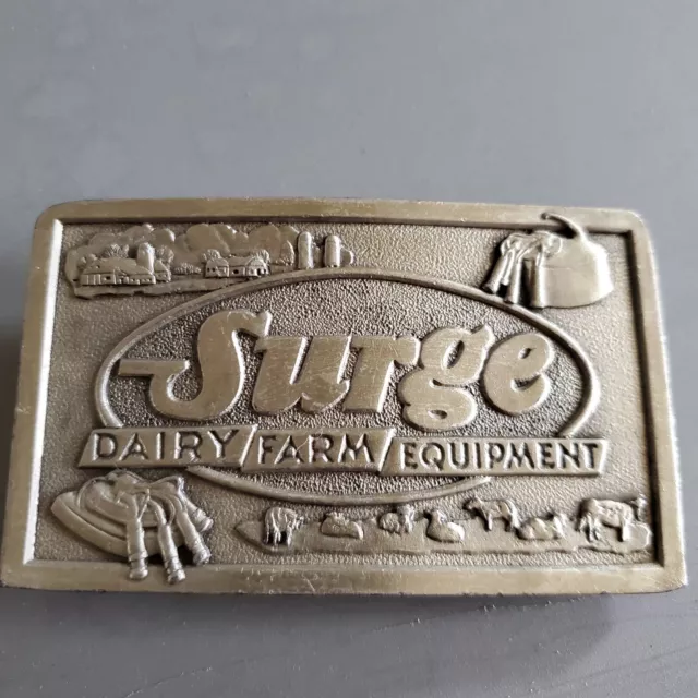 Vintage 1976 Jimm Watson Surge Dairy Farm Equipment Belt Buckle Pre-Owned