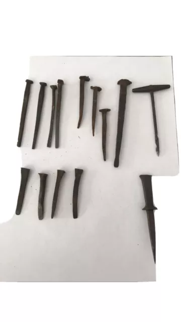 12 Primitive Antique Old Stock Hand Forged Iron Cut Nails. Lot Of 12