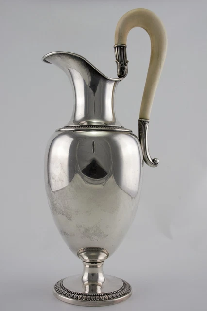 AN ANTIQUE SILVER .800 PITCHER HALLMARKED, 600g.