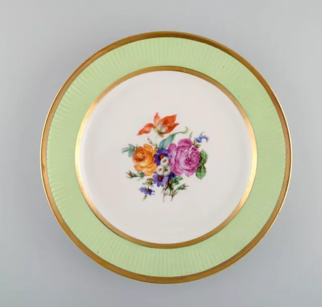 Royal Copenhagen plate in hand-painted porcelain with floral motif.