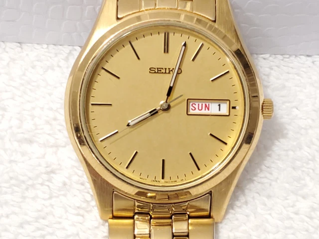 VINTAGE SEIKO MEN'S Gold Tone Day Date Quartz Watch Stainless