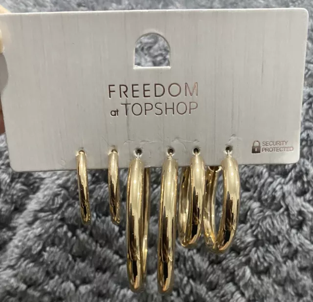Gold hoop hotsell earrings topshop