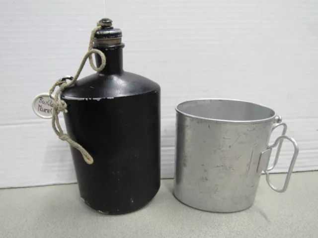 https://www.picclickimg.com/jBgAAOSwj91lkHl3/Vintage-Swiss-Army-Canteen-Water-Bottle-Model-1932.webp
