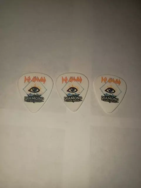 Picks Def Leppard 3 difernt  guitar picks Def white