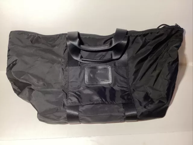 Tumi tote with trolley sleeve hot sale