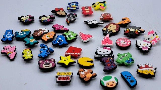 Lot Of 40 Assorted Jibbitz Crocs Shoe Charms Care Bears Hello Kitty Disney Mario