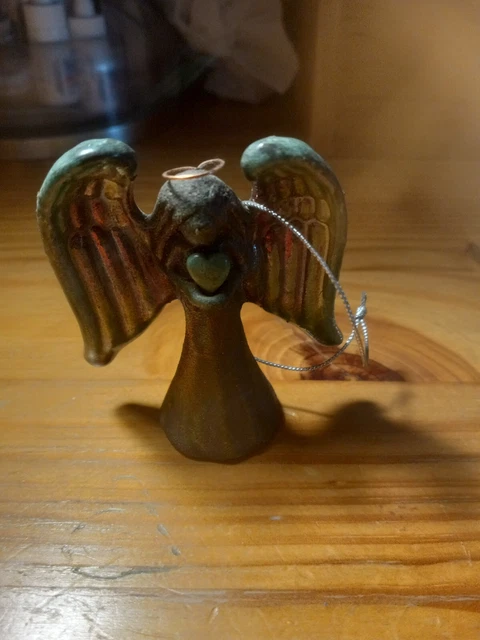 New Raku handmade spirit angel holding a heart signed by the artist