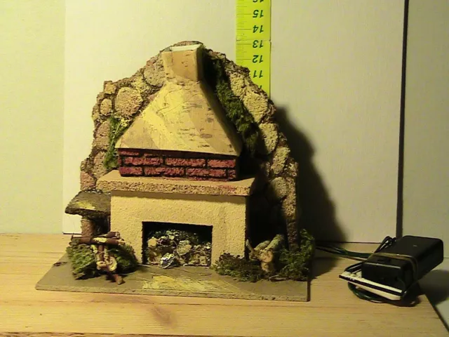 Attrezzi per  Presepe  CAMINO IN LEGNO ILLUMINATO CON FUOCO.. serie ? vedi foto