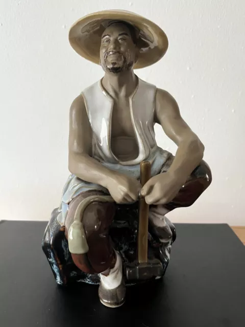 Chinese Mudman Figure - Seated Man With Hammer