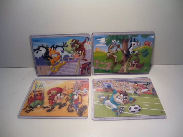 Ü Ei Puzzle 2010 Looney Tunes Active 4-teilig mit allen BPZ in   4 Schutzhüllen